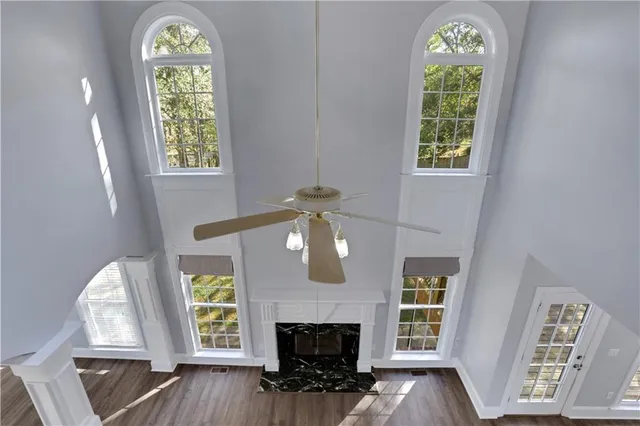 a bathroom with a shower sink and mirror