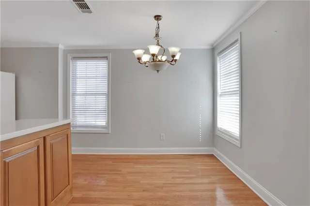 an aerial view of a house with a swimming pool