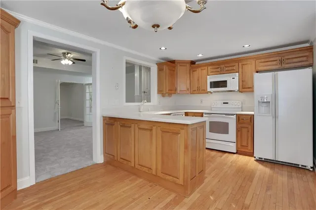 a view of swimming pool with outdoor seating and yard