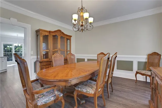 a view of an entryway with wooden floor