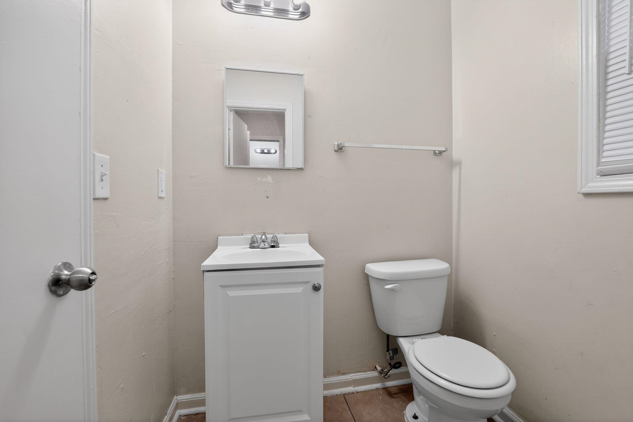 4725 Lofts Road Memphis, TN 38118 - Photo 22 of 32 Bathroom featuring vanity and tile patterned flooring
