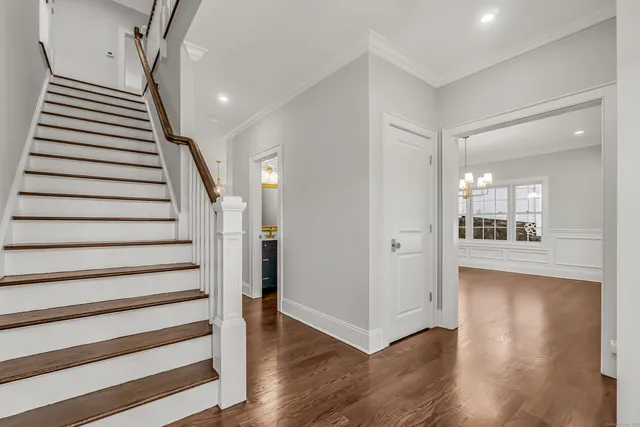 a view of entryway with wooden floor