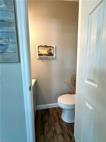a bathroom with a toilet and a sink