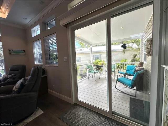 a view of a living room and dining room