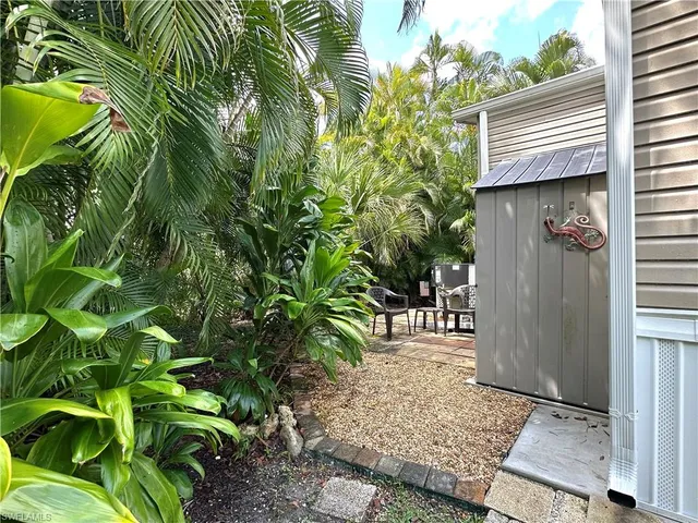 a backyard of a house with lots of green space