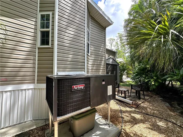 a view of a house with a door and a chair