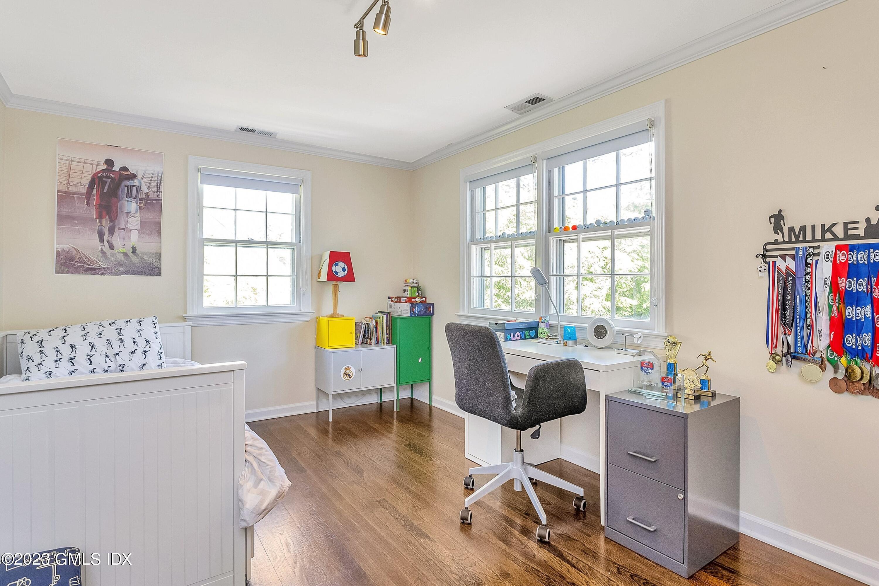 4 Bramble Lane Riverside, CT 06878 - Photo 12 of 19 a living room with furniture and a wooden floor