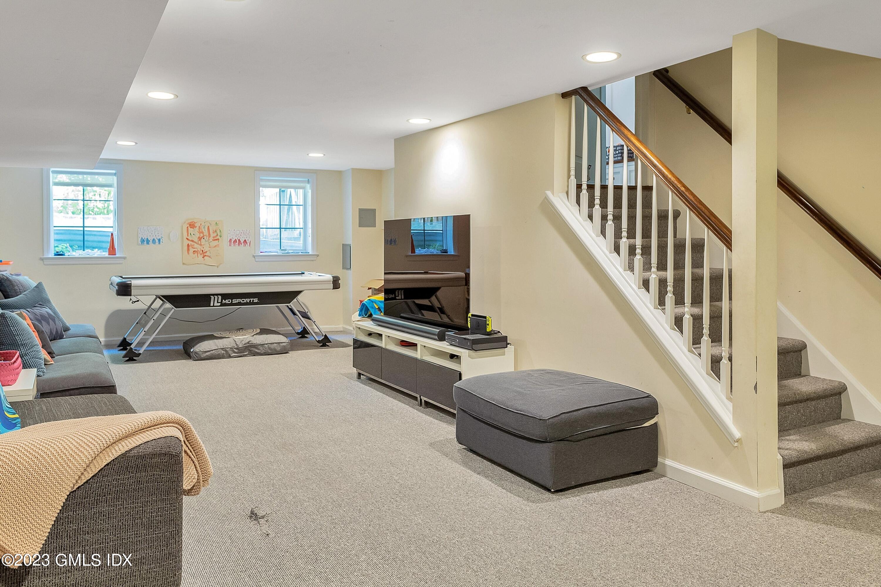4 Bramble Lane Riverside, CT 06878 - Photo 15 of 19 a living room with furniture and a wooden floor