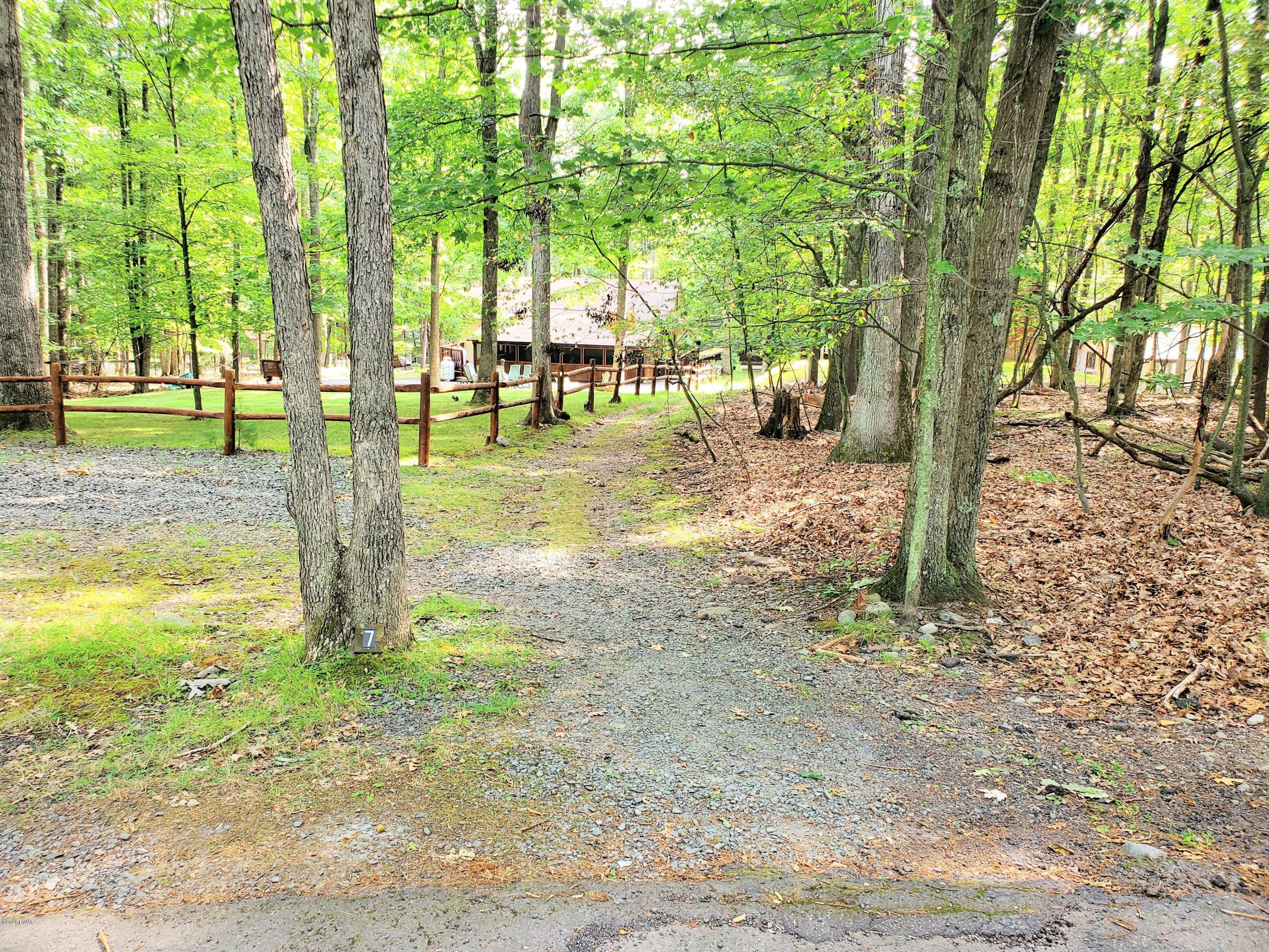 8 Sunny Point Road Lakeville, PA 18438 - Photo 23 of 27 Lake path across driveway
