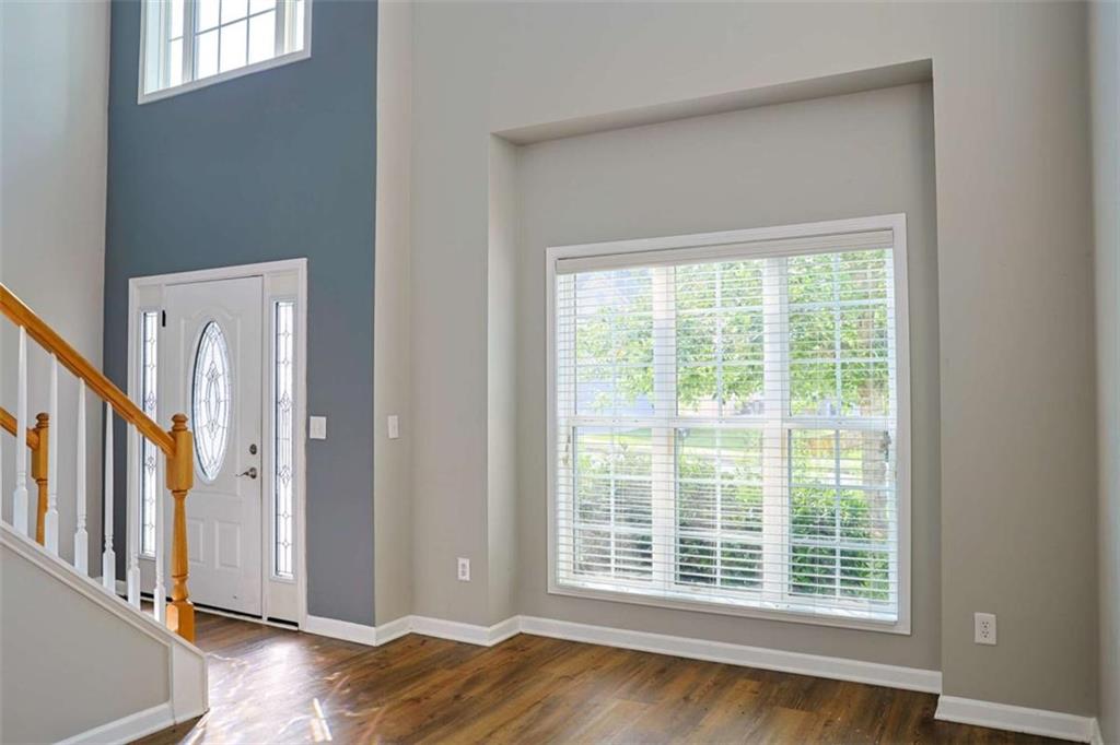 910 Lakeside Court Loganville, GA 30052 - Photo 9 of 57 a view of livingroom with furniture and window