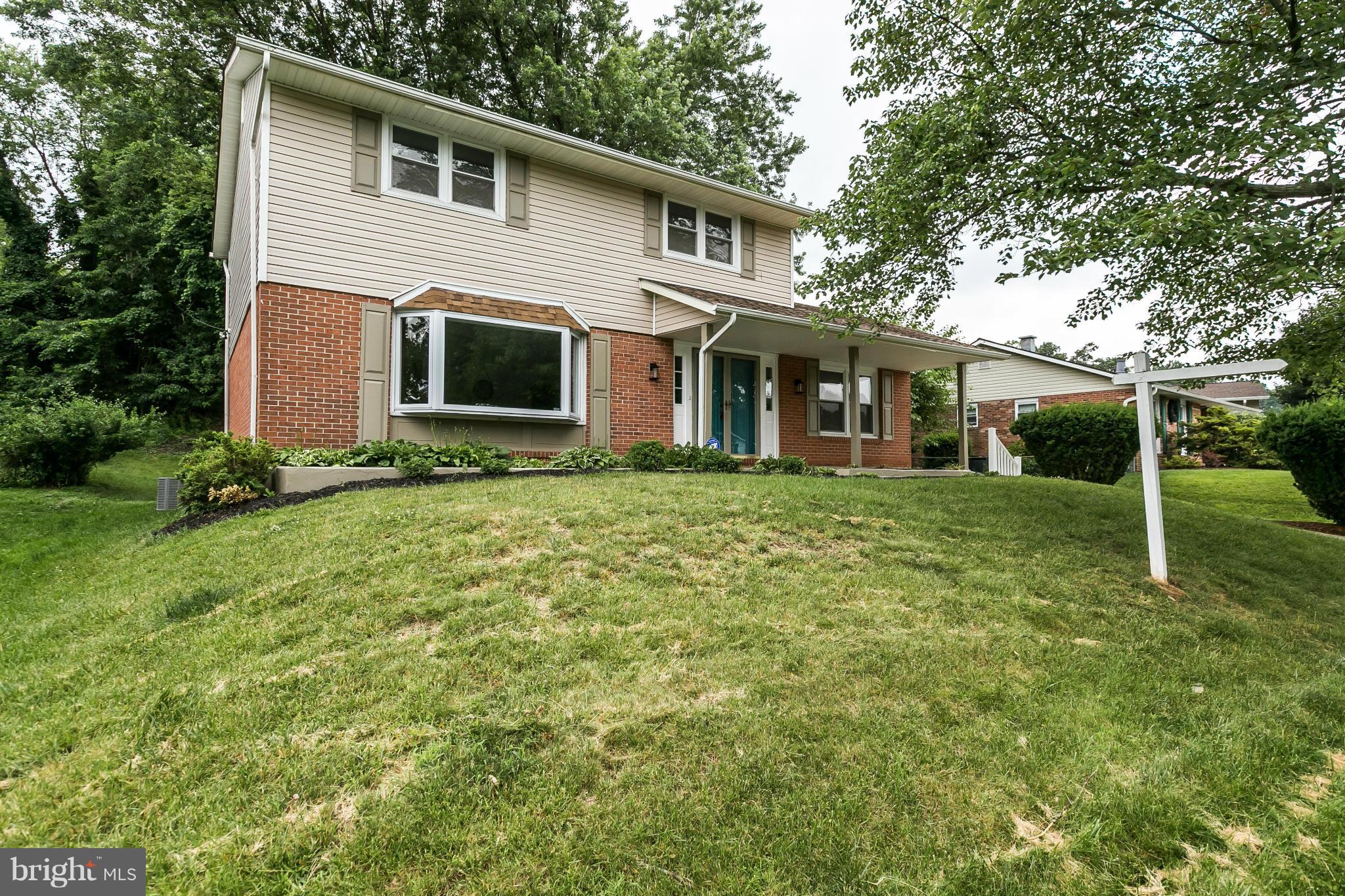 4527 Tapscott Road Baltimore, MD 21208 - Photo 1 of 30 a view of a house with backyard and garden