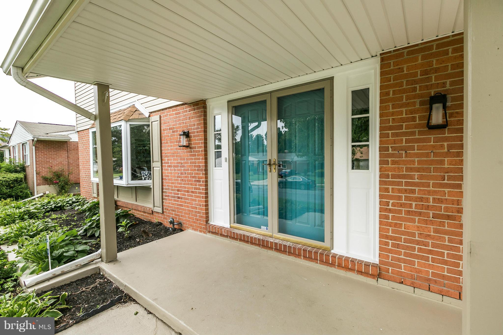 4527 Tapscott Road Baltimore, MD 21208 - Photo 2 of 30 a porch with seating space