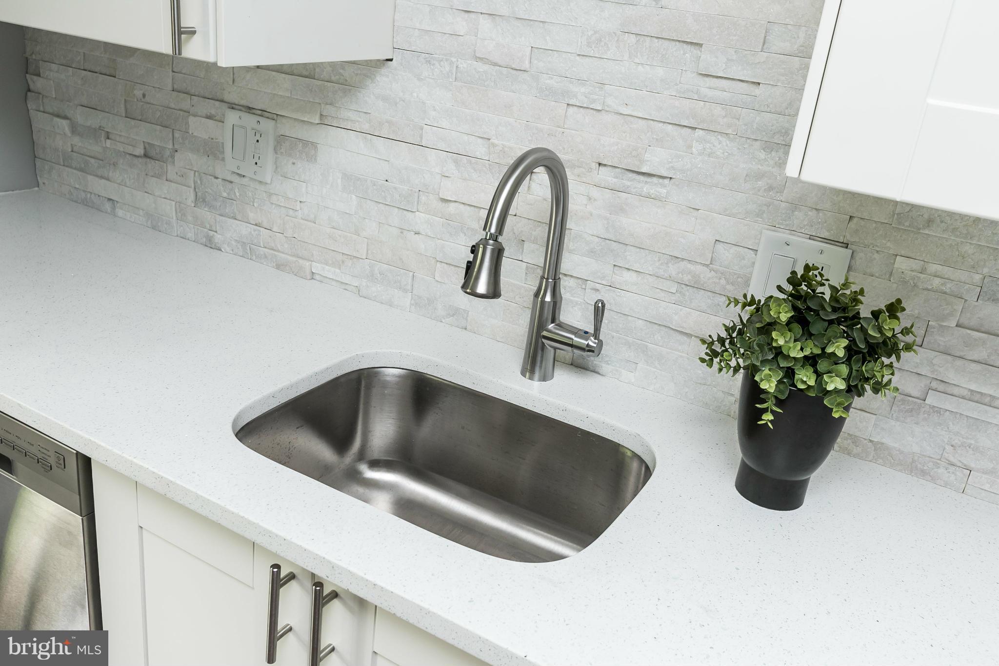 4527 Tapscott Road Baltimore, MD 21208 - Photo 14 of 30 a close view of sink and tap