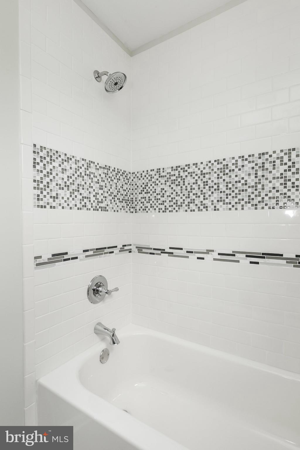 4527 Tapscott Road Baltimore, MD 21208 - Photo 18 of 30 a bathroom with a bathtub