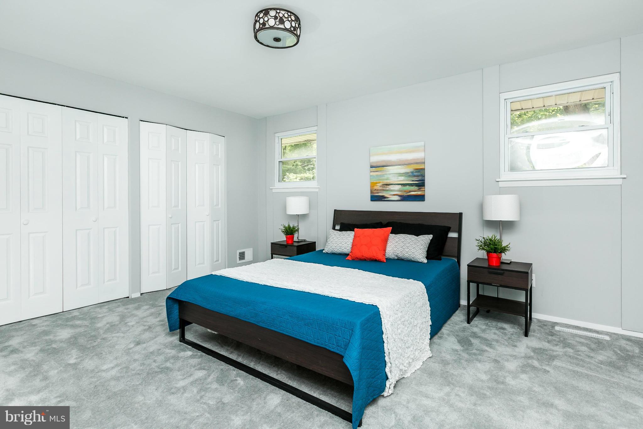 4527 Tapscott Road Baltimore, MD 21208 - Photo 19 of 30 a bedroom with a bed and window