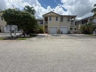 a view of a house with a patio