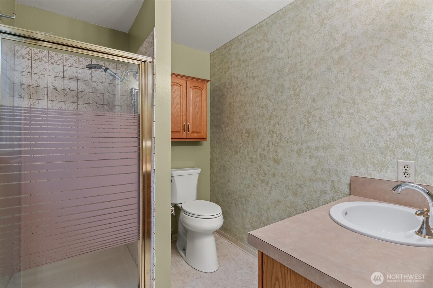 2207 Bremerton Avenue Northeast Renton, WA 98059 - Photo 15 of 40 a bathroom with a sink and a toilet