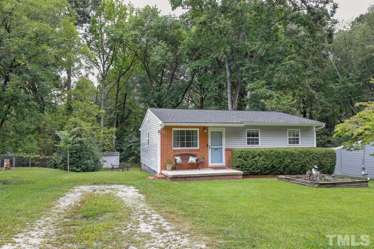 1306 Valley Road Garner, NC 27529 - Photo 18 of 18 a view of an house that has garden