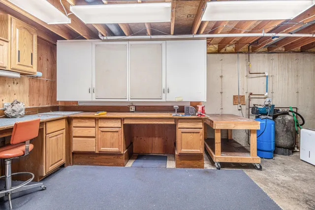 a kitchen with stainless steel appliances granite countertop a stove and a sink