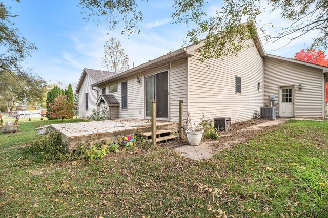 a front view of house with yard having outdoor seating