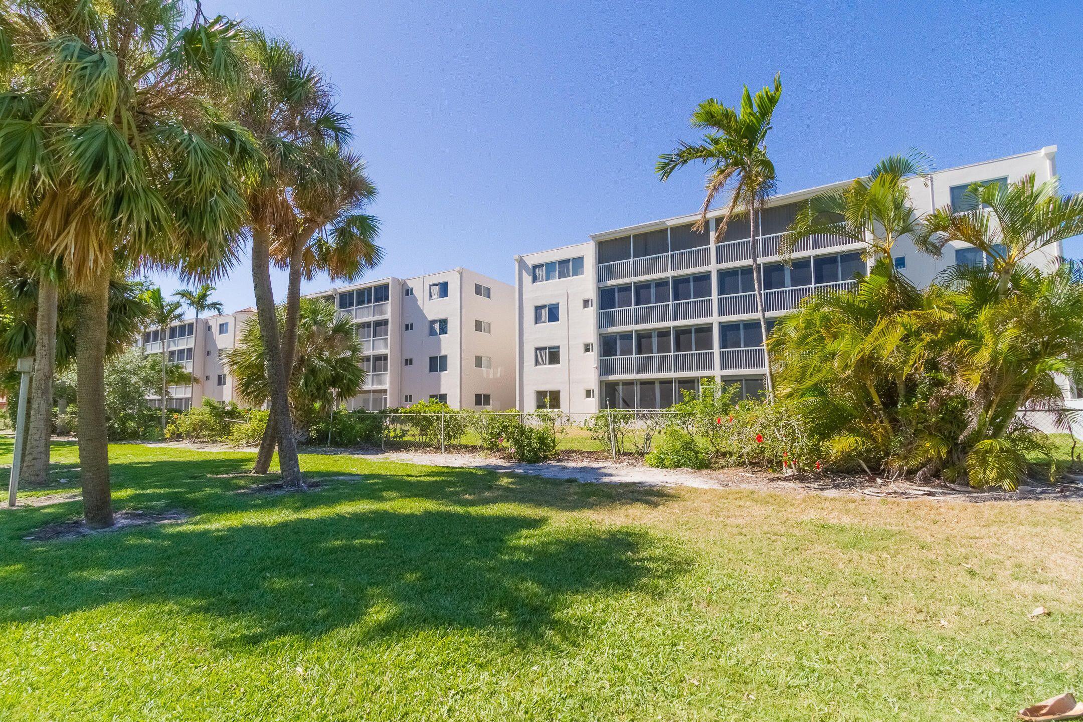 300 East Royal Palm Road, Unit 42B Boca Raton, FL 33432 - Photo 37 of 51 a view of a palm trees in front of a building