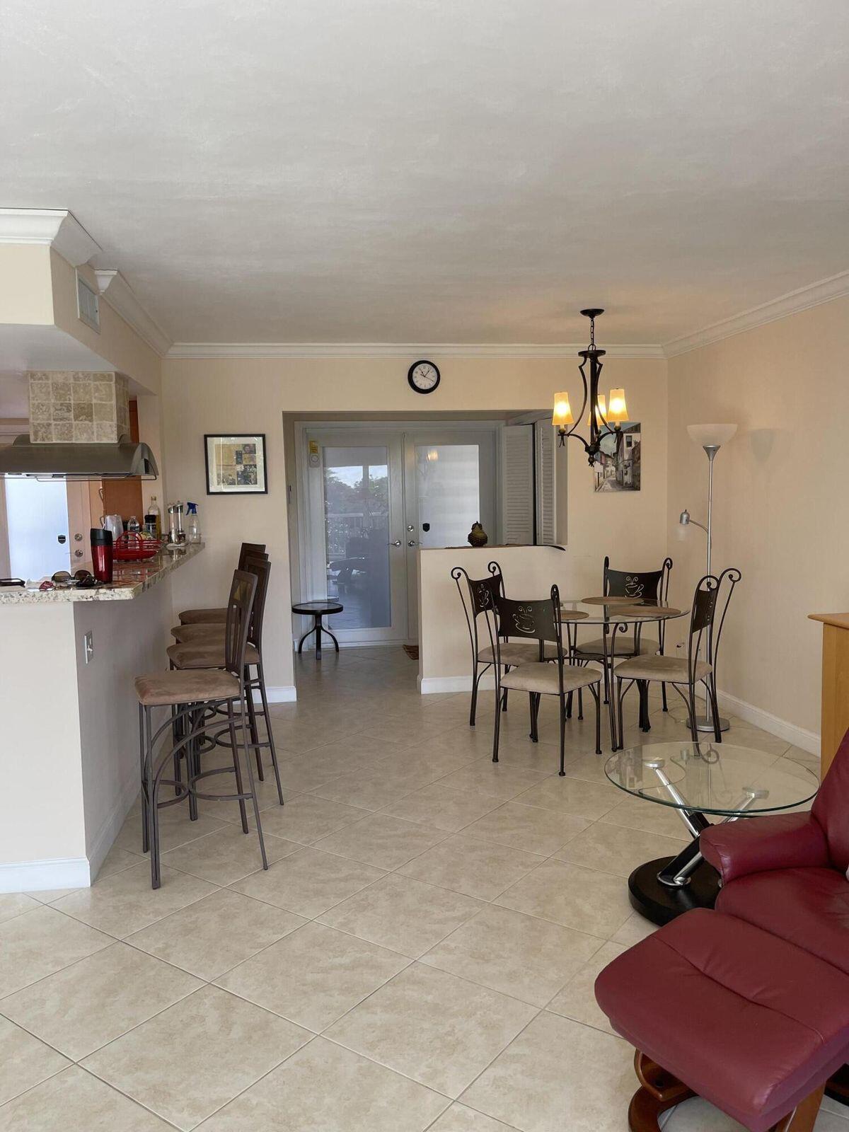 300 East Royal Palm Road, Unit 42B Boca Raton, FL 33432 - Photo 51 of 51 a view of a dining room with furniture