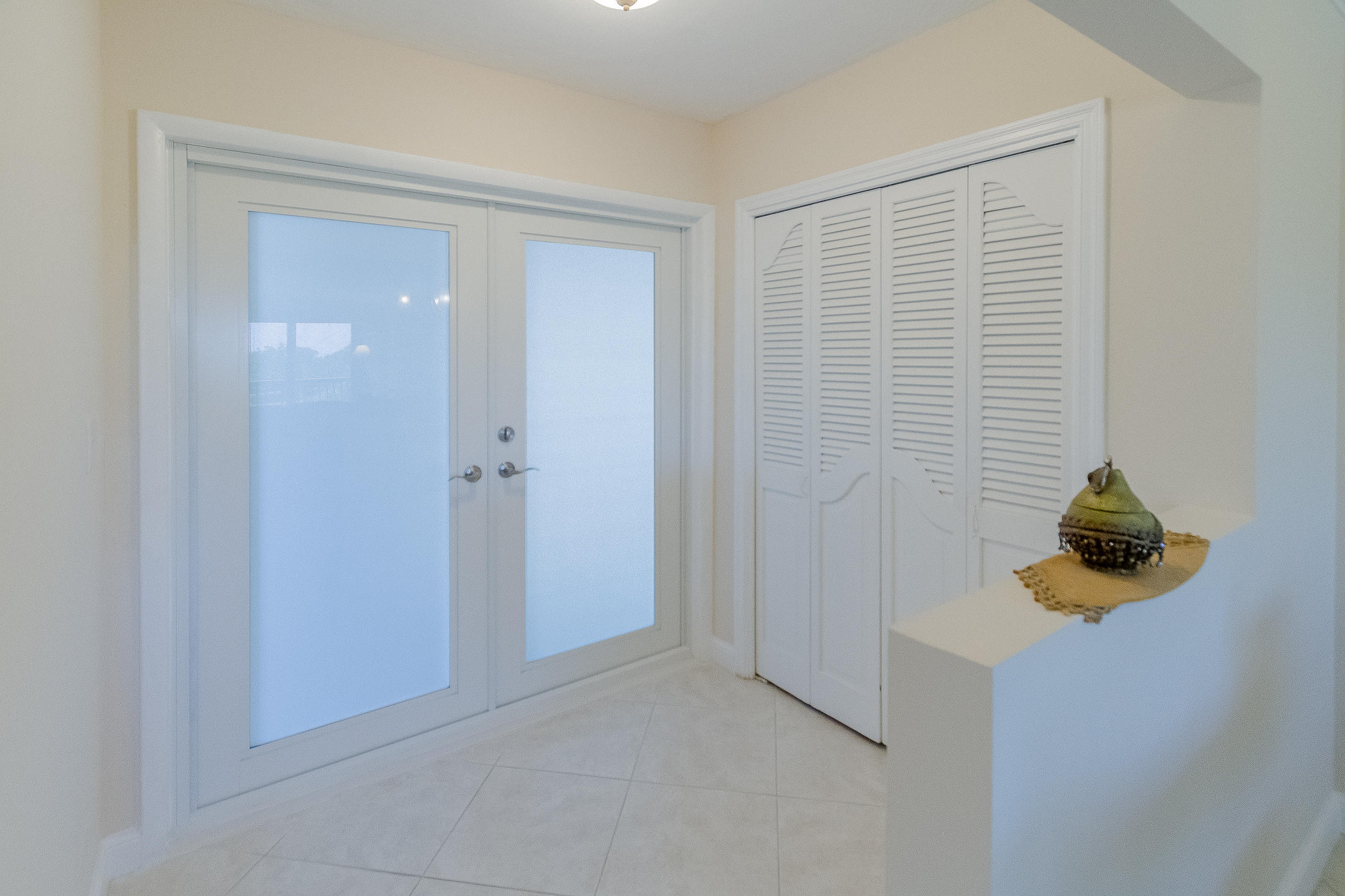 300 East Royal Palm Road, Unit 42B Boca Raton, FL 33432 - Photo 8 of 51 a view of a room that has a window in it