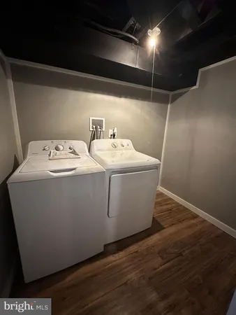 a utility room with washer and dryer