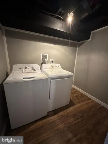 a utility room with washer and dryer