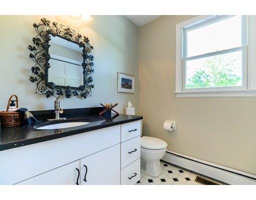 7 Snowberry Road Andover, MA 01810 - Photo 17 of 30 a bathroom with a sink and mirror with toilet