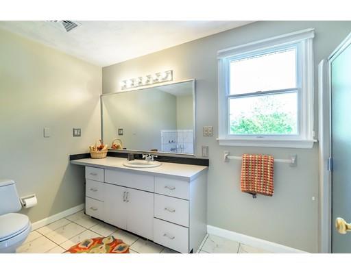 7 Snowberry Road Andover, MA 01810 - Photo 20 of 30 a bathroom with a sink and a mirror