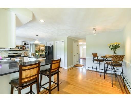 7 Snowberry Road Andover, MA 01810 - Photo 7 of 30 a dining room with furniture and wooden floor