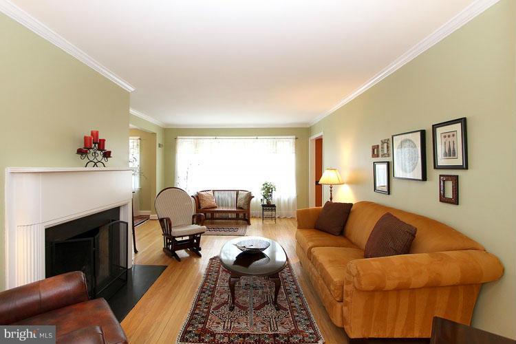 3229 Park View Road Chevy Chase, MD 20815 - Photo 5 of 29 Living Room w/fireplace opens to Dining Room too!