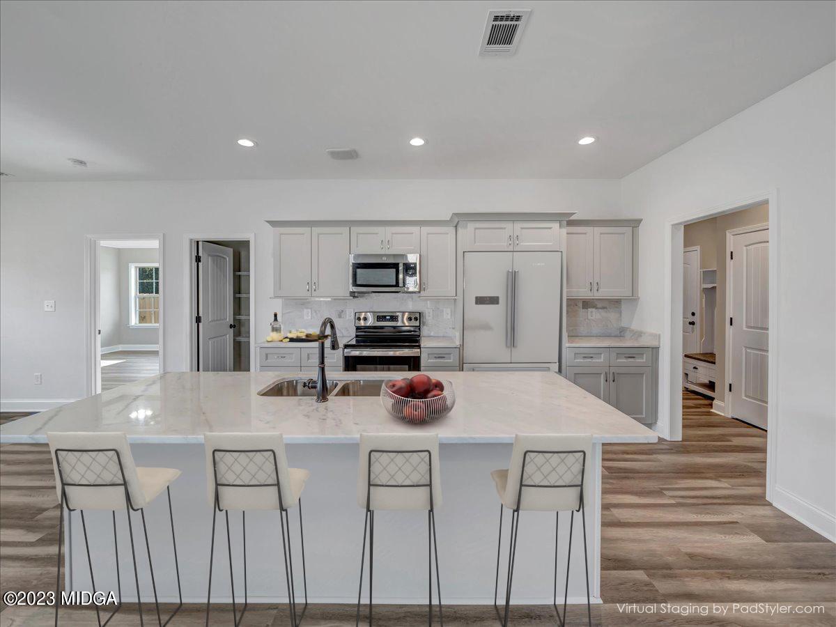 104 Raspberry Trail Perry, GA 31069 - Photo 3 of 60 1b - Kitchen