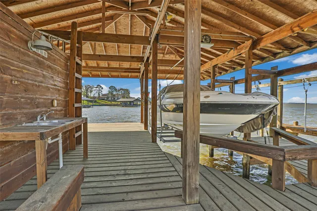 a view of a balcony with wooden floor