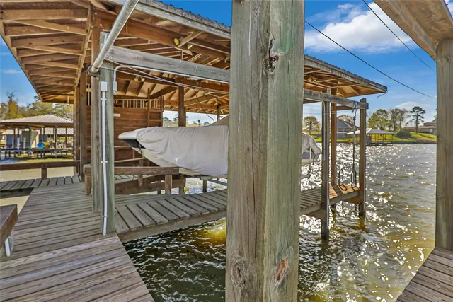 a view of balcony with wooden floor