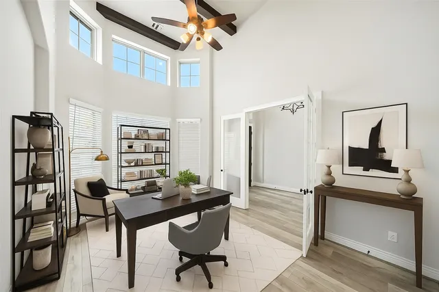 a view of a workspace with furniture