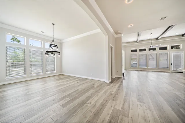 a view of a livingroom with wooden floor