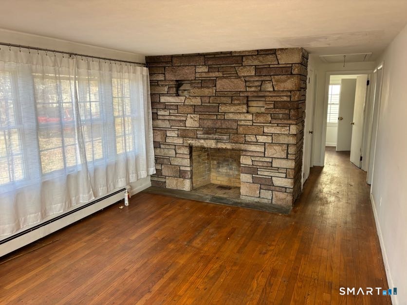 8 Prospect Hill Deep River, CT 06417 - Photo 2 of 10 wooden floor in an empty room with a window