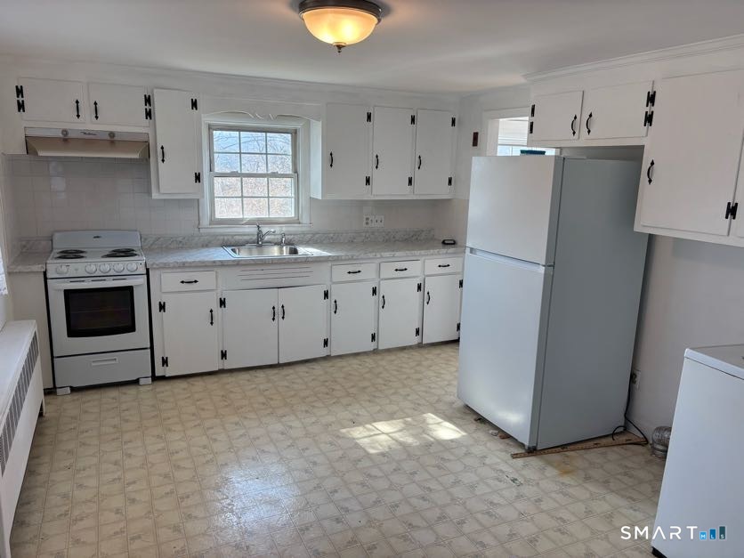 8 Prospect Hill Deep River, CT 06417 - Photo 3 of 10 a kitchen with stainless steel appliances a refrigerator sink and cabinets