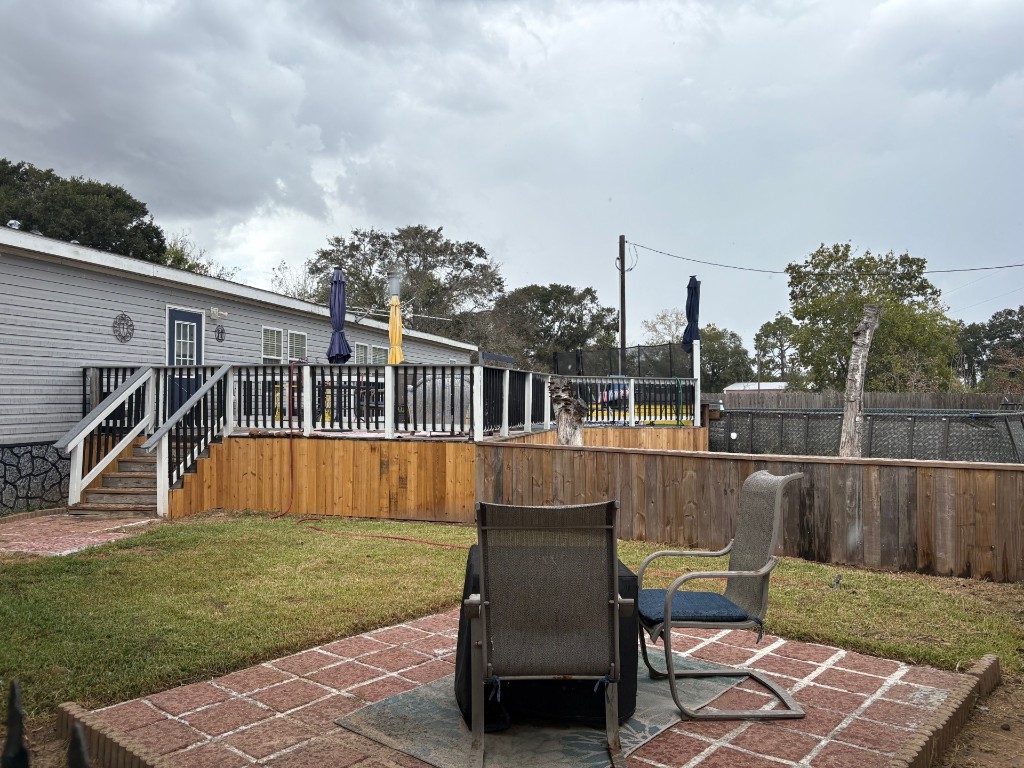 1873 FM 1163 Road El Campo, TX 77437 - Photo 22 of 48 a view of a house with a big yard