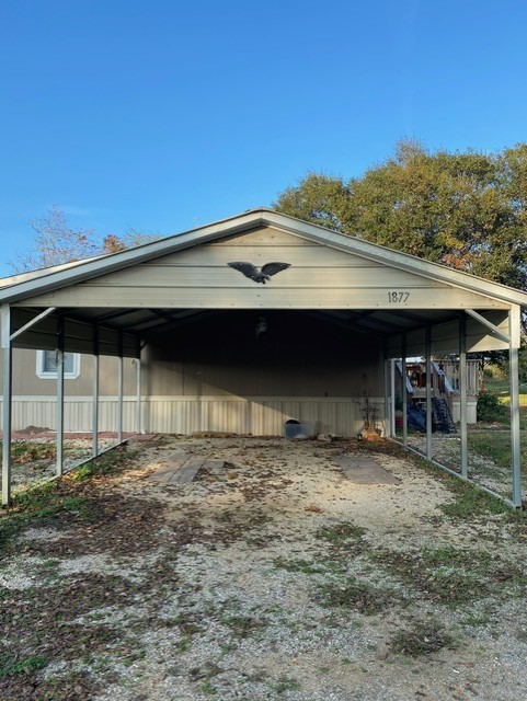 1873 FM 1163 Road El Campo, TX 77437 - Photo 23 of 48 a view of a car garage