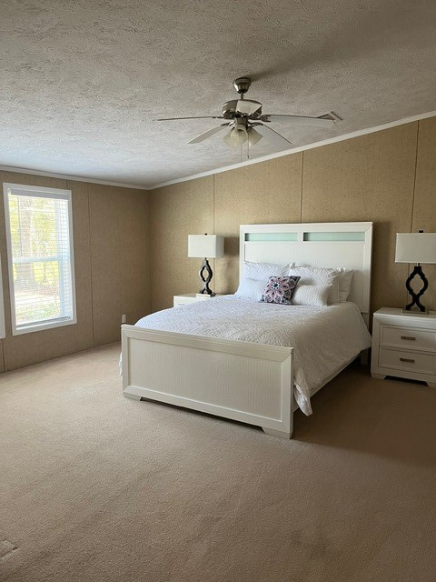 1873 FM 1163 Road El Campo, TX 77437 - Photo 40 of 48 a bedroom with a bed and a chandelier