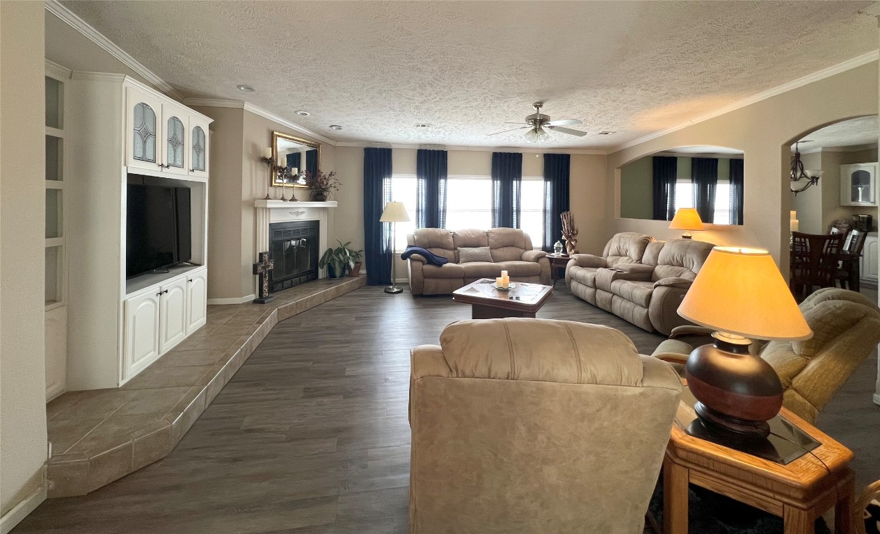 1873 FM 1163 Road El Campo, TX 77437 - Photo 4 of 48 a living room with furniture and a flat screen tv