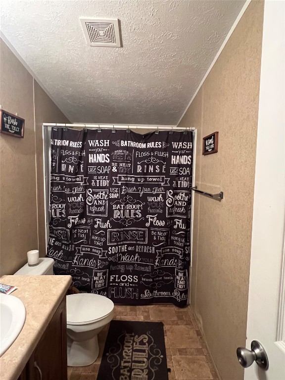 1873 FM 1163 Road El Campo, TX 77437 - Photo 44 of 48 a bathroom with a sink a toilet and shower