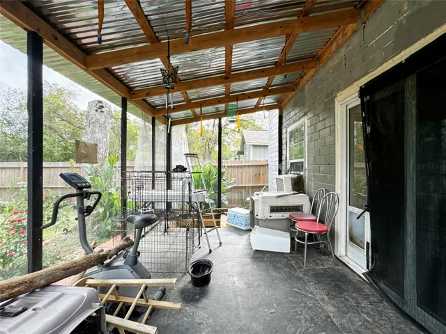 a view of a patio with swimming pool