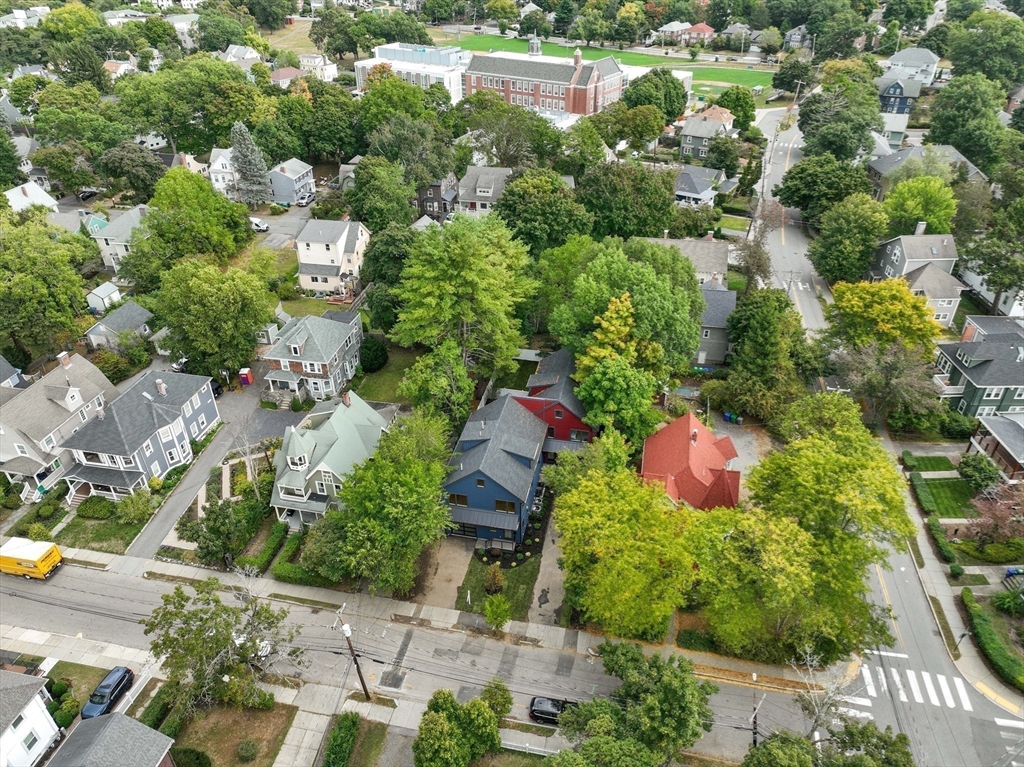 110 Harvard Street, Unit A Newton, MA 02460 - Photo 28 of 30 an aerial view of residential house with outdoor space and trees all around