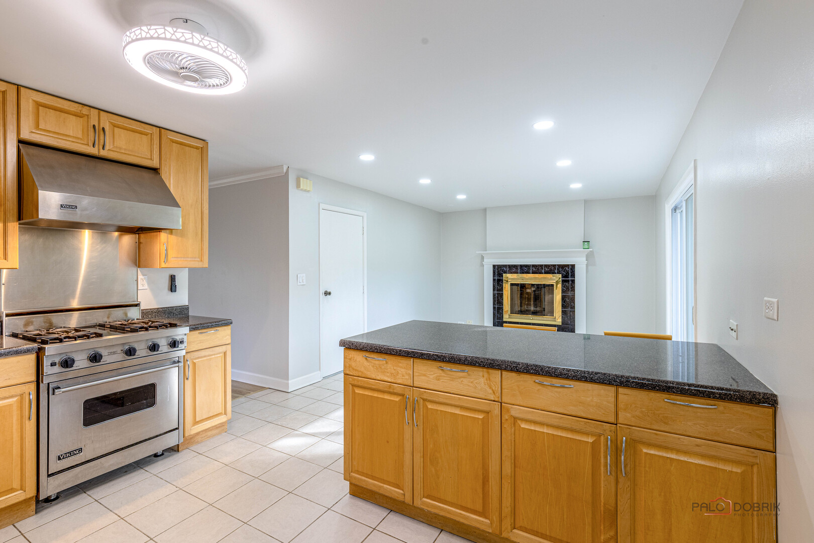 533 Cherry Lane Glenview, IL 60025 - Photo 16 of 33 a kitchen with white cabinets and a stove