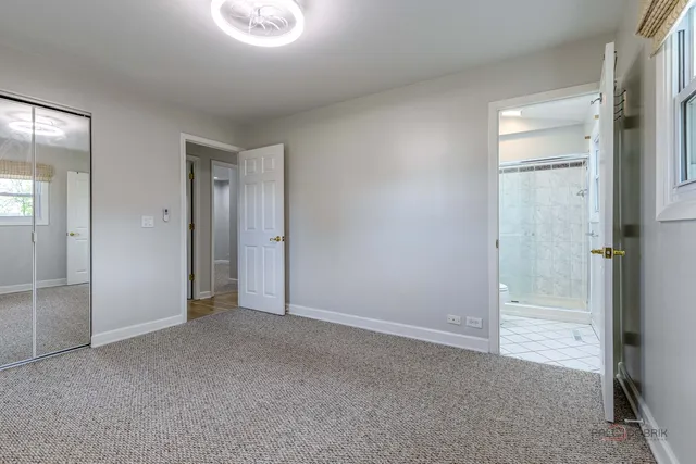 wooden floor and closet in a room
