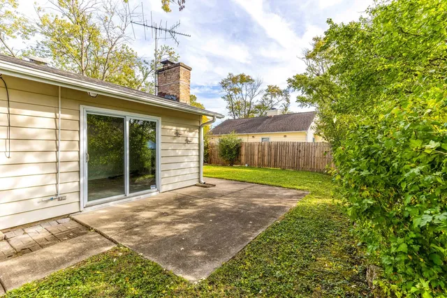 a view of a backyard with a garden